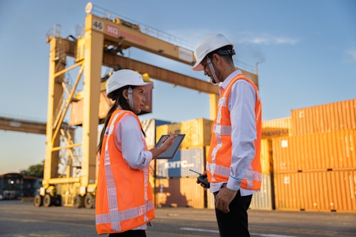 Freight supervisors discussing cargo yard plan